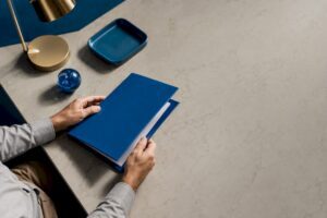 Hands closing a power of attorney folder